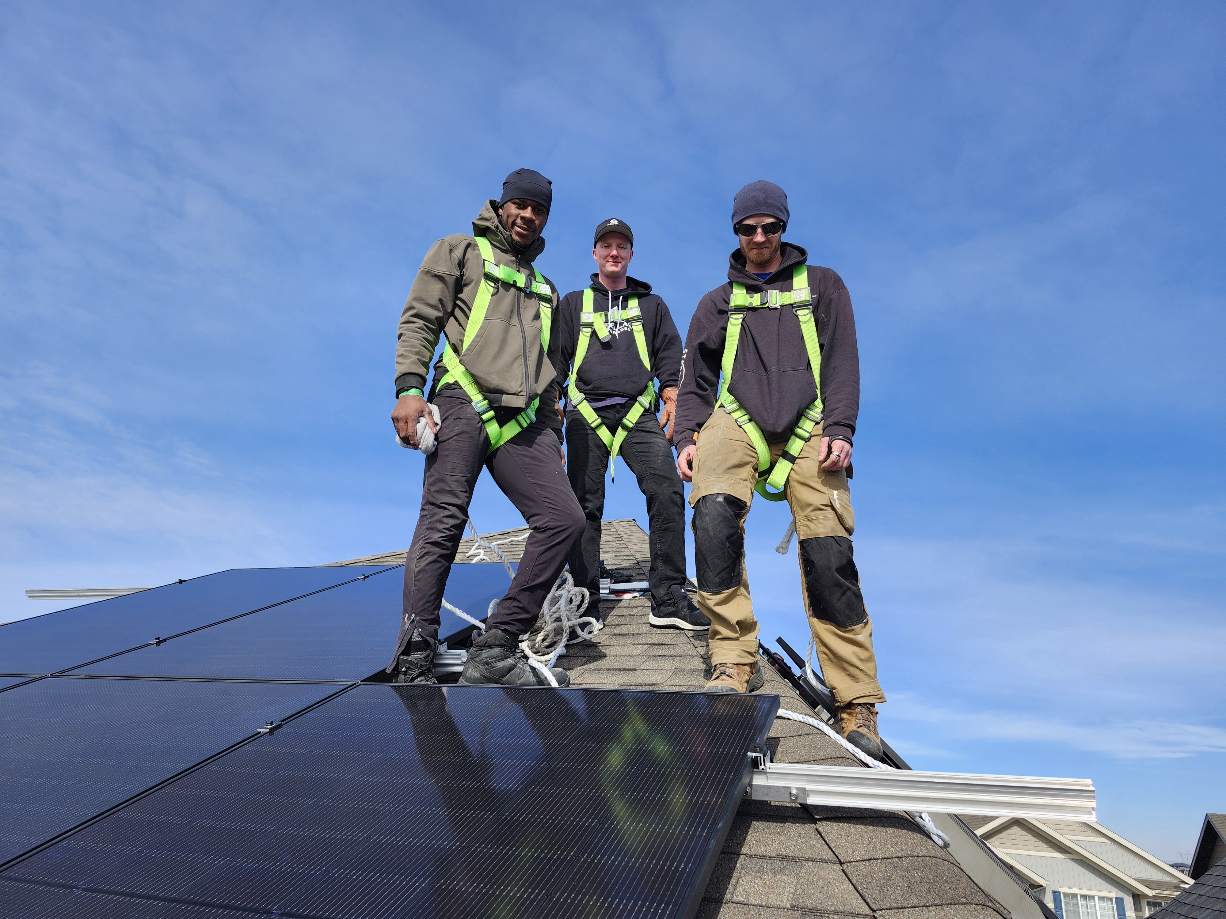 Stellar Upgrades crew installing solar panels on an Edmonton rooftop