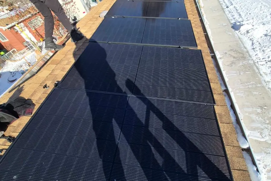Stellar Upgrades in-house crew installing solar panels on an Alberta residential rooftop
