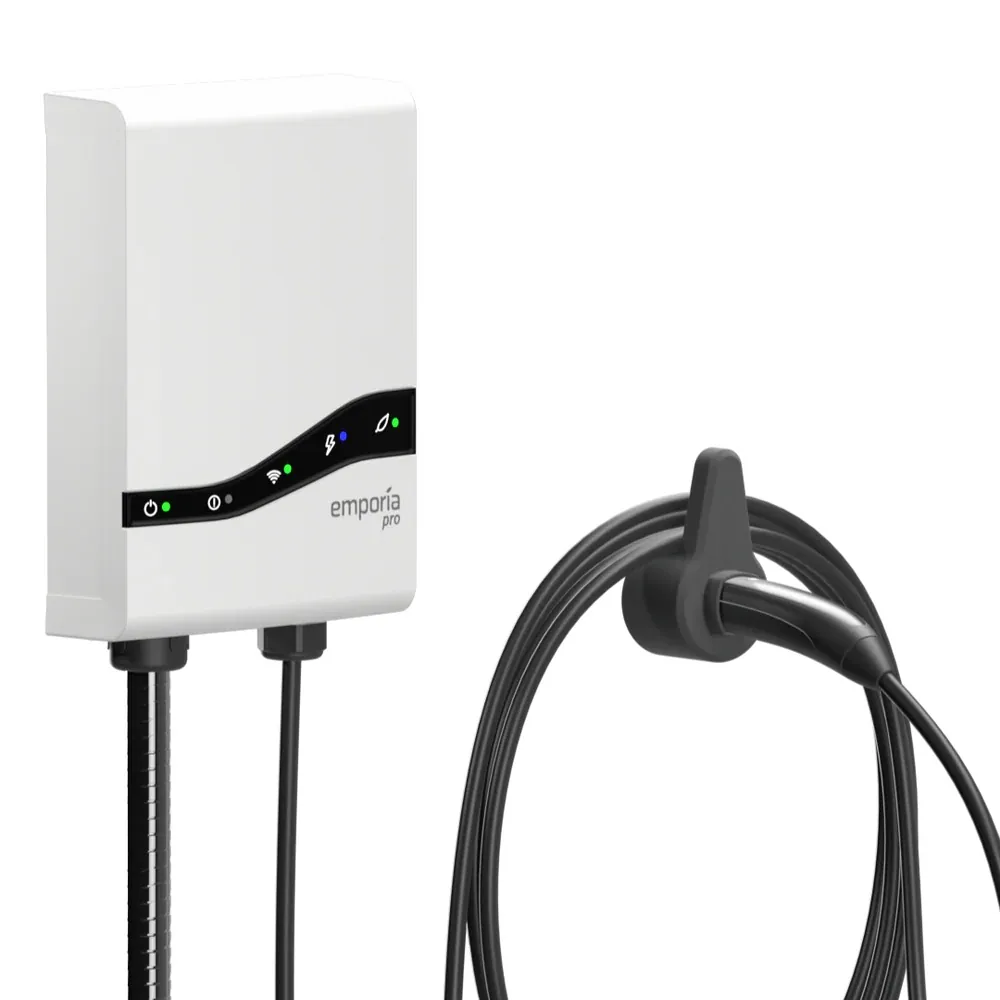 White Emporia Pro EV charger with J1772 charging cable and wall-mounted holster