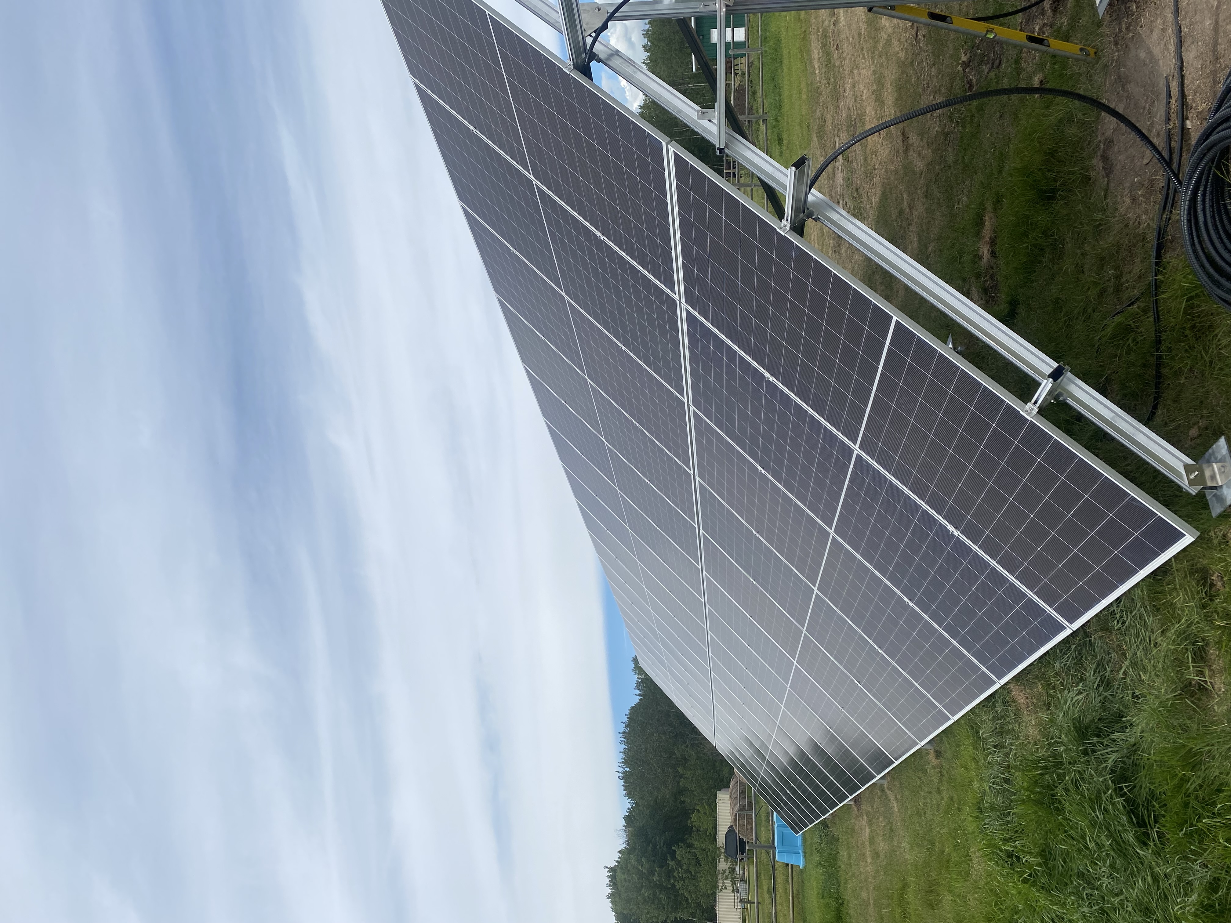 Close-up of LONGi Hi-MO X10 650W ground-mount solar panels on Blackfalds farm
