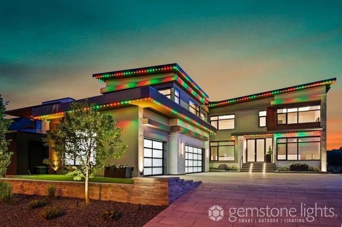 Modern home lit in multiple colours with Gemstone permanent lighting